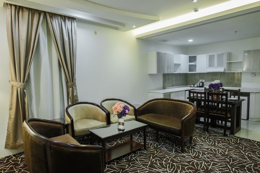 Rest Night Serviced Apartments- Alhamra Riad Exterior foto A living room in a typical apartment