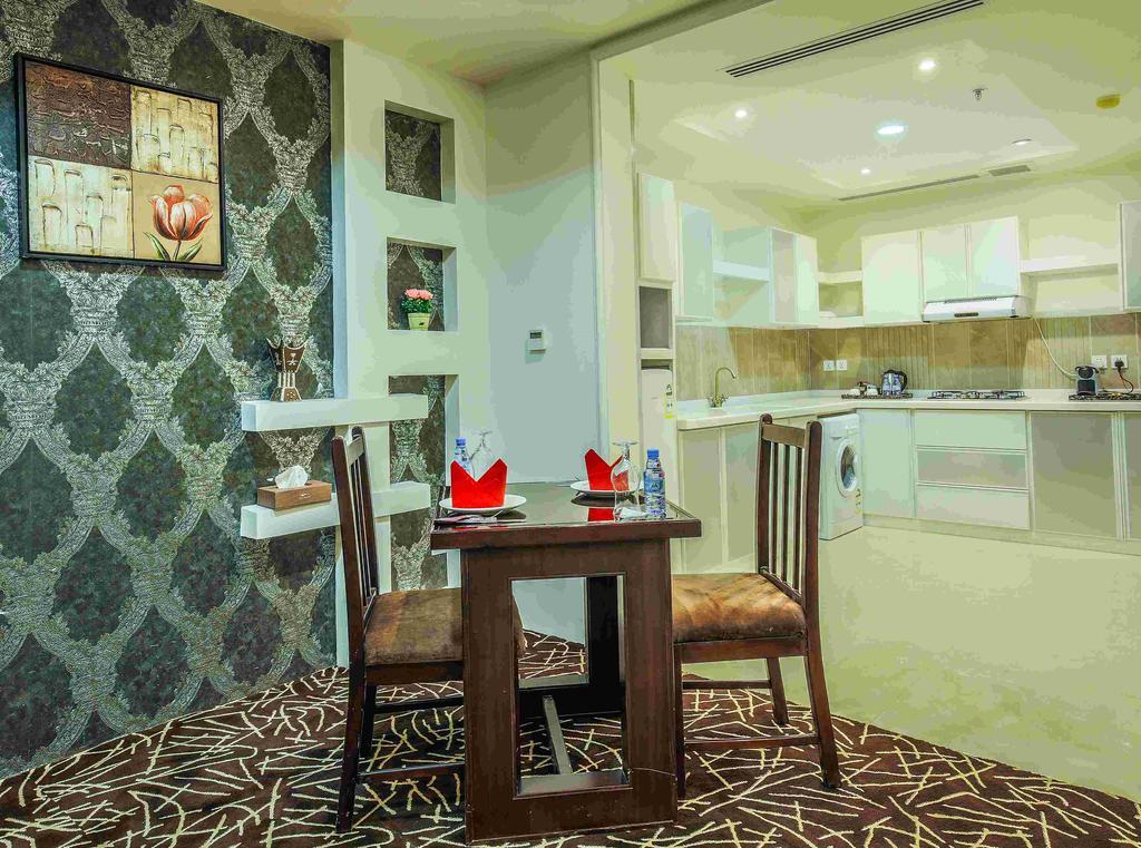 Rest Night Serviced Apartments- Alhamra Riad Exterior foto A kitchen in a hotel suite
